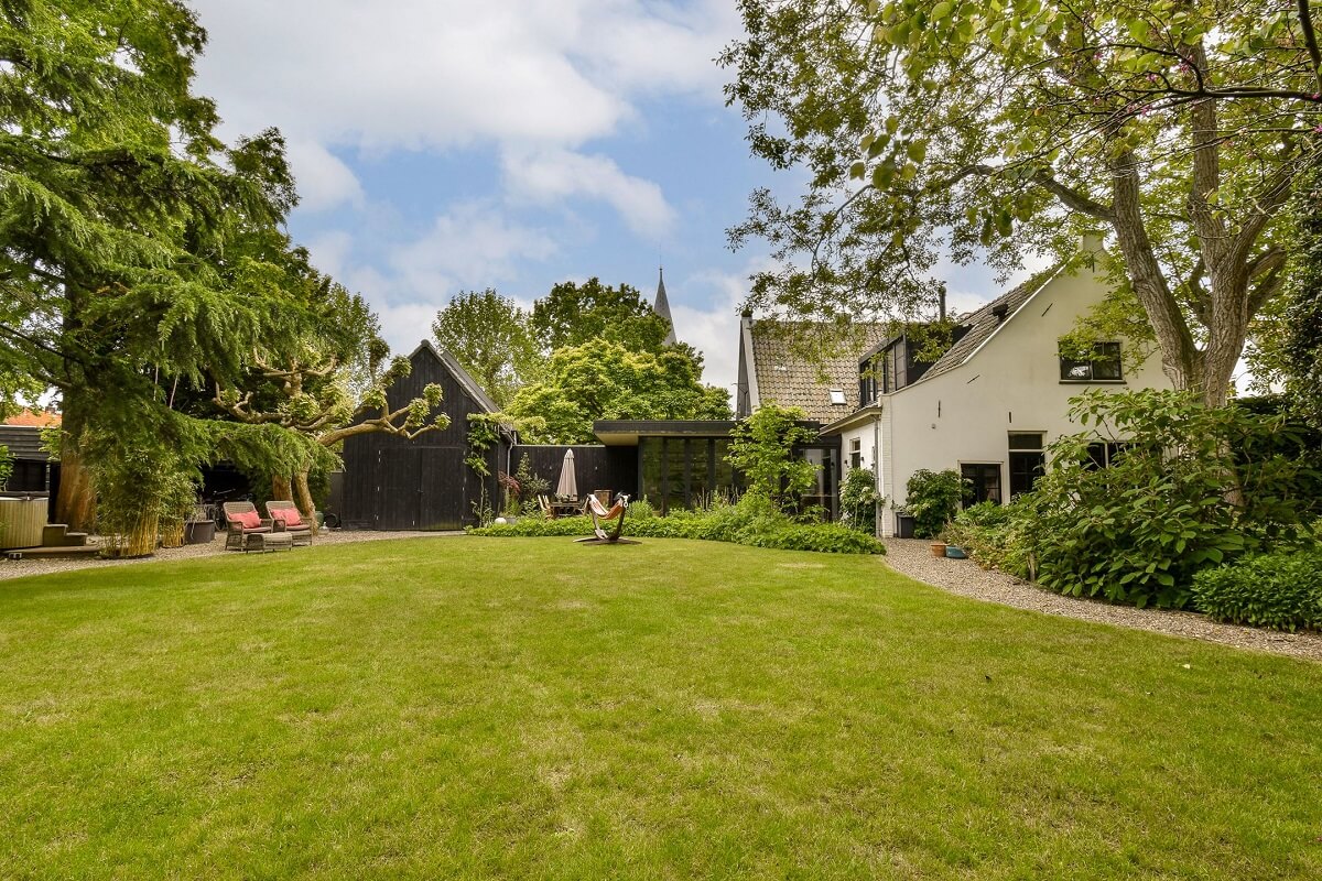 Wooden Interiors in a Historic Dutch Family Home 32 lawn-green-garden