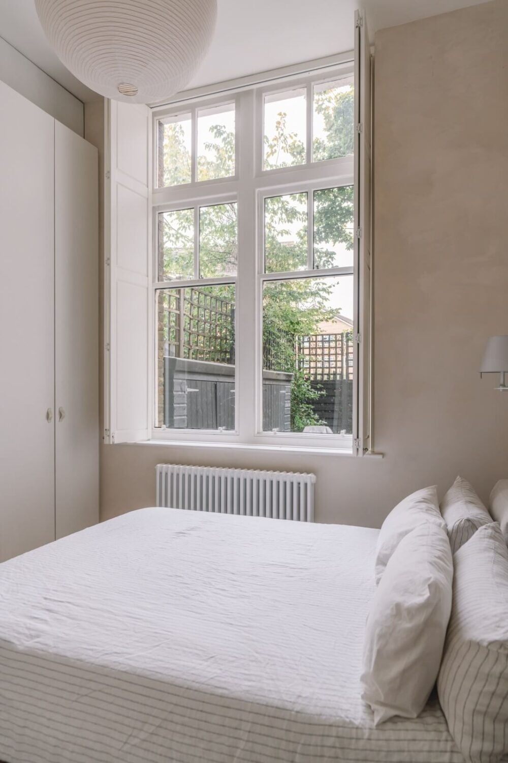 High Ceilings and Modern Design in a Light London Apartment 13 light bedroom built in wardrobes nordroom