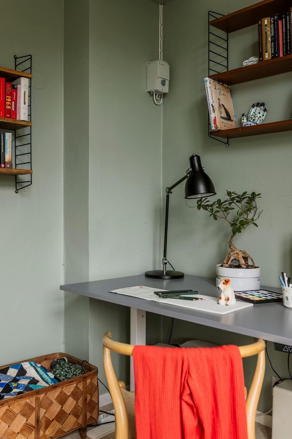 A Swedish Apartment with a Yellow Living Room 14 light gray green walls home office