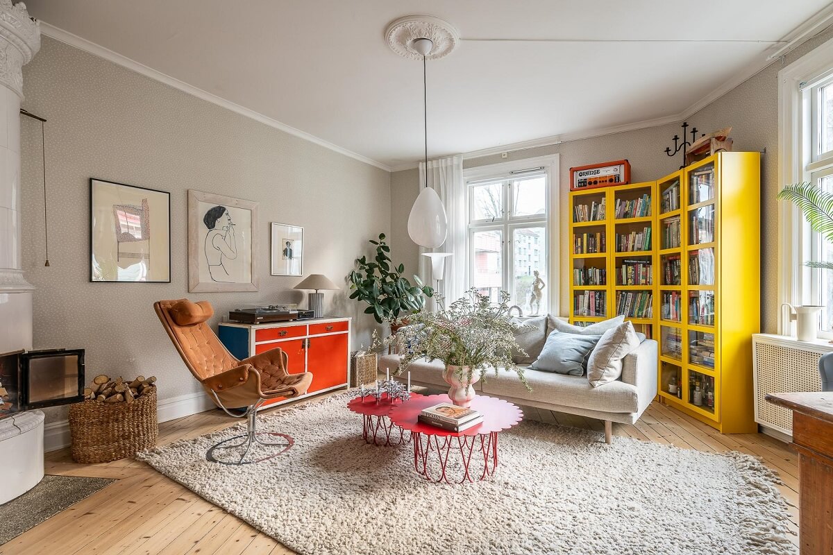 Primary Color Accents in a Light Swedish Apartment 1 light-living-room-bold-color-accents-nordroom