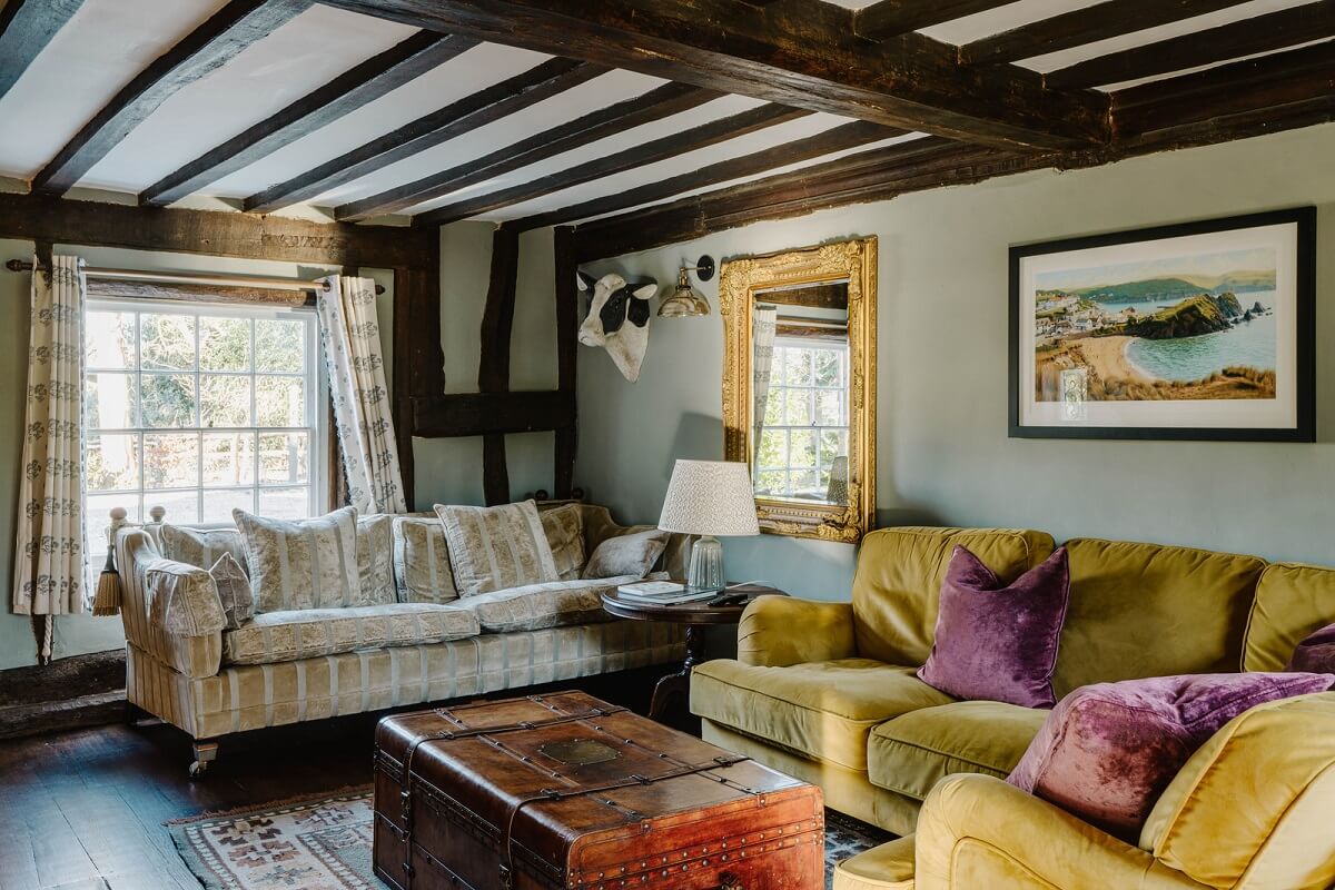 A Cozy Historic English Country House with Exposed Beams 7 living room exposed wooden beams historic english house nordroom