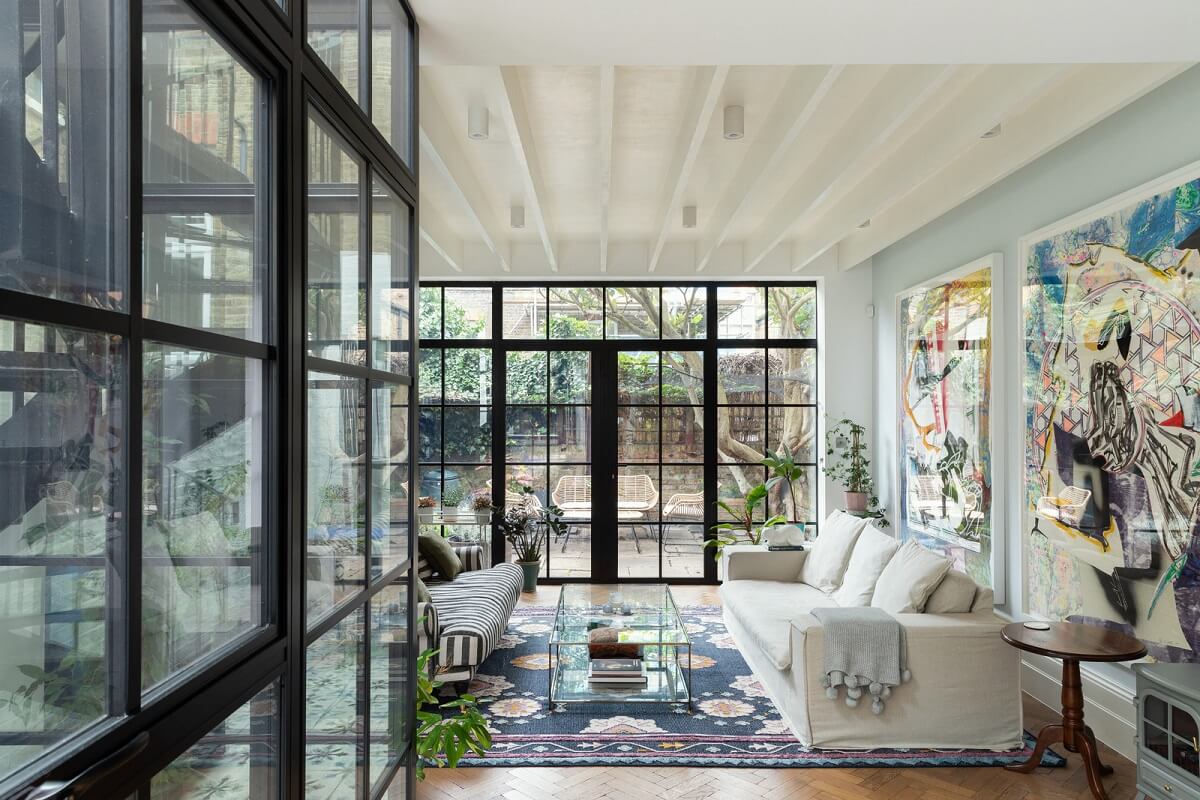 A Victorian House in London with Three Outdoor Spaces 10 living room large art crittal windows