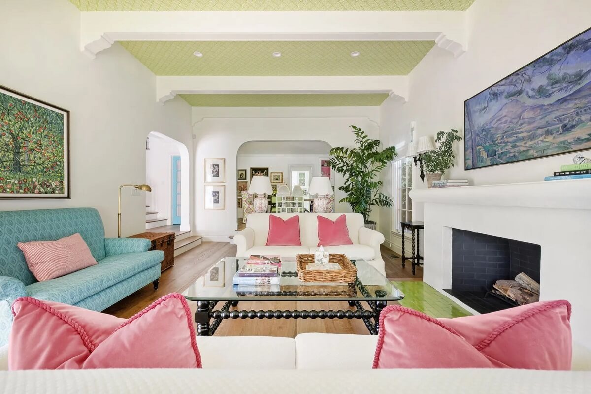 Emma Stone's Colorful Spanish-Style Los Angeles Home is For Sale 2 living-room-pink-blue-color-accents-emma-stone-nordroom