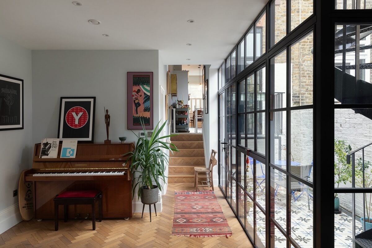 A Victorian House in London with Three Outdoor Spaces 7 living room with piano