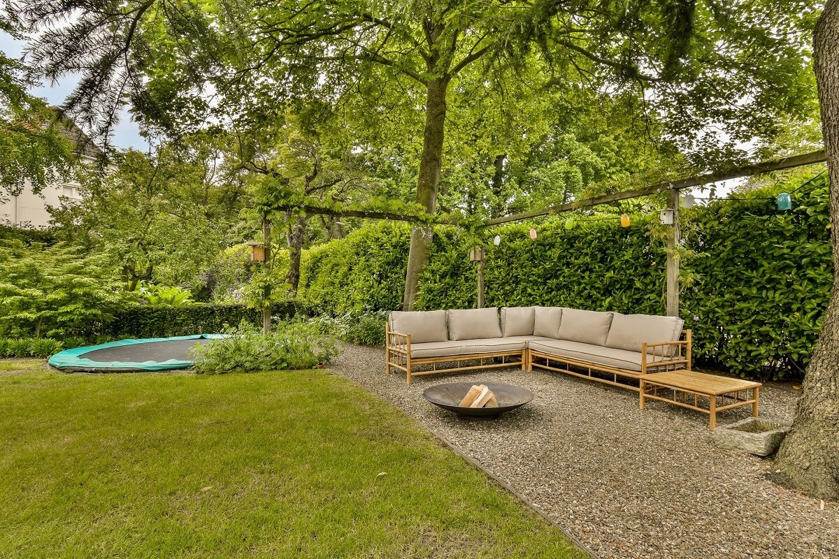 Wooden Interiors in a Historic Dutch Family Home 28 lounge-space-green-garden