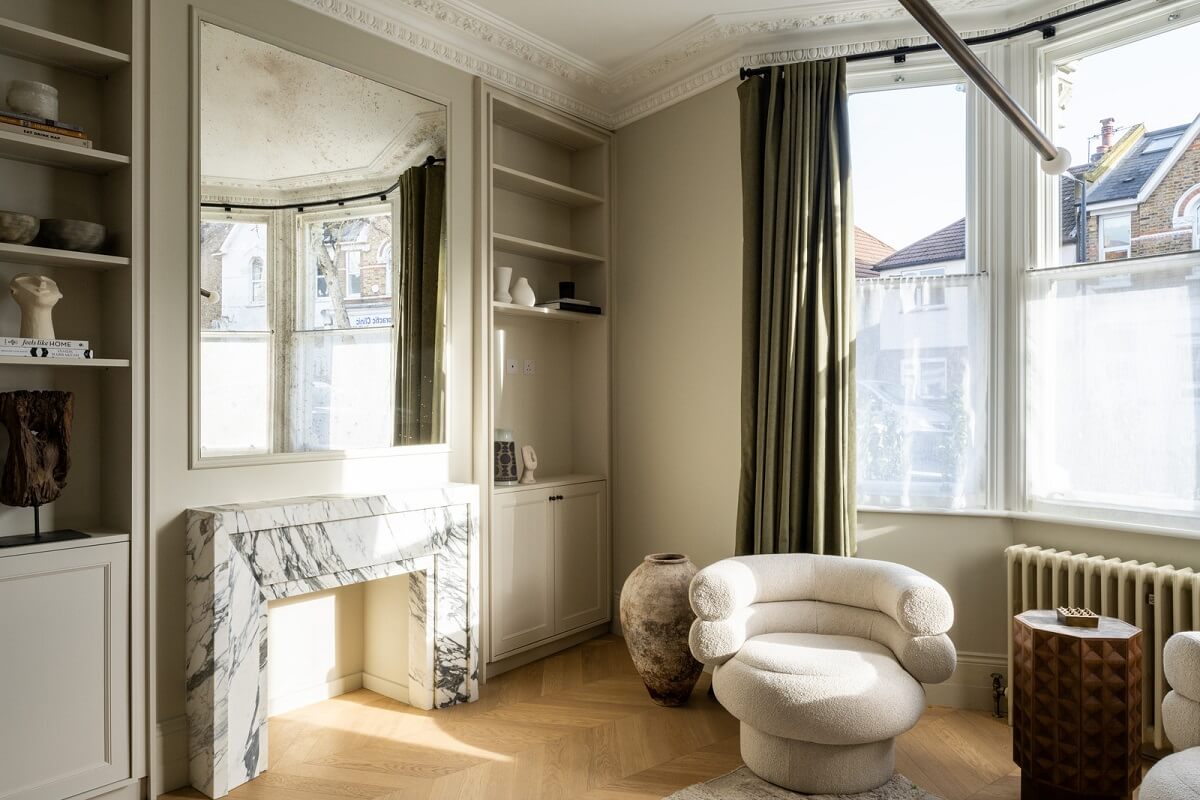 A Renovated Victorian House with Oak Features 5 marble fireplace mantel living room