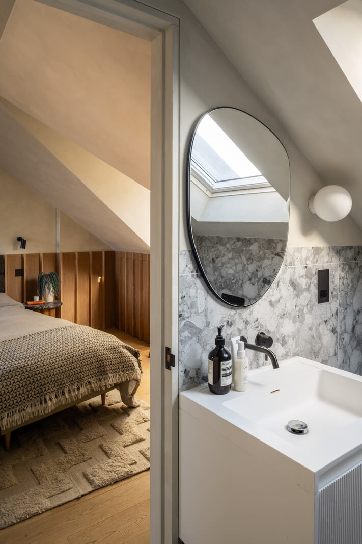 A Renovated Victorian House with Oak Features 20 master bedroom en suite slanted ceiling nordroom