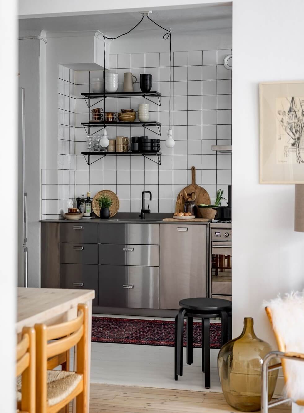 A Light Apartment with a Stainless Steel Kitchen 11 open plan living room stainless steel kitchen nordroom