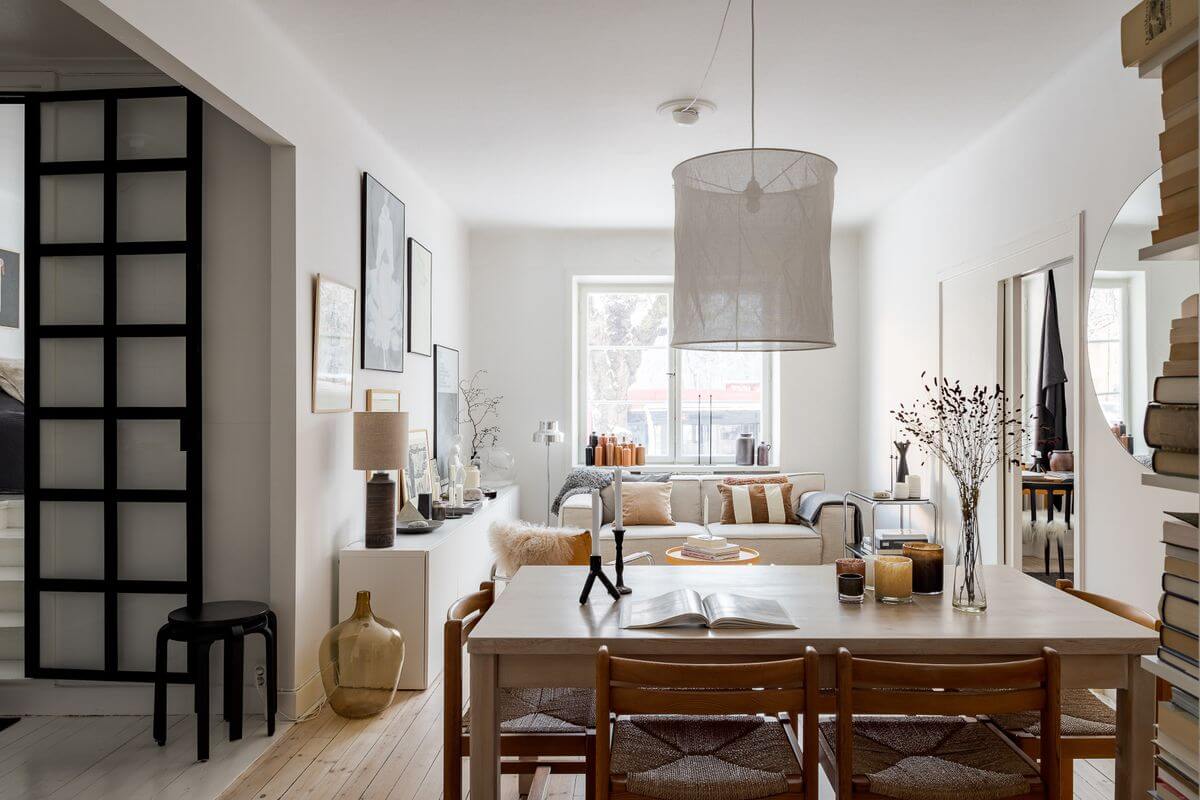 A Light Apartment with a Stainless Steel Kitchen 5 open plan living space with dining table