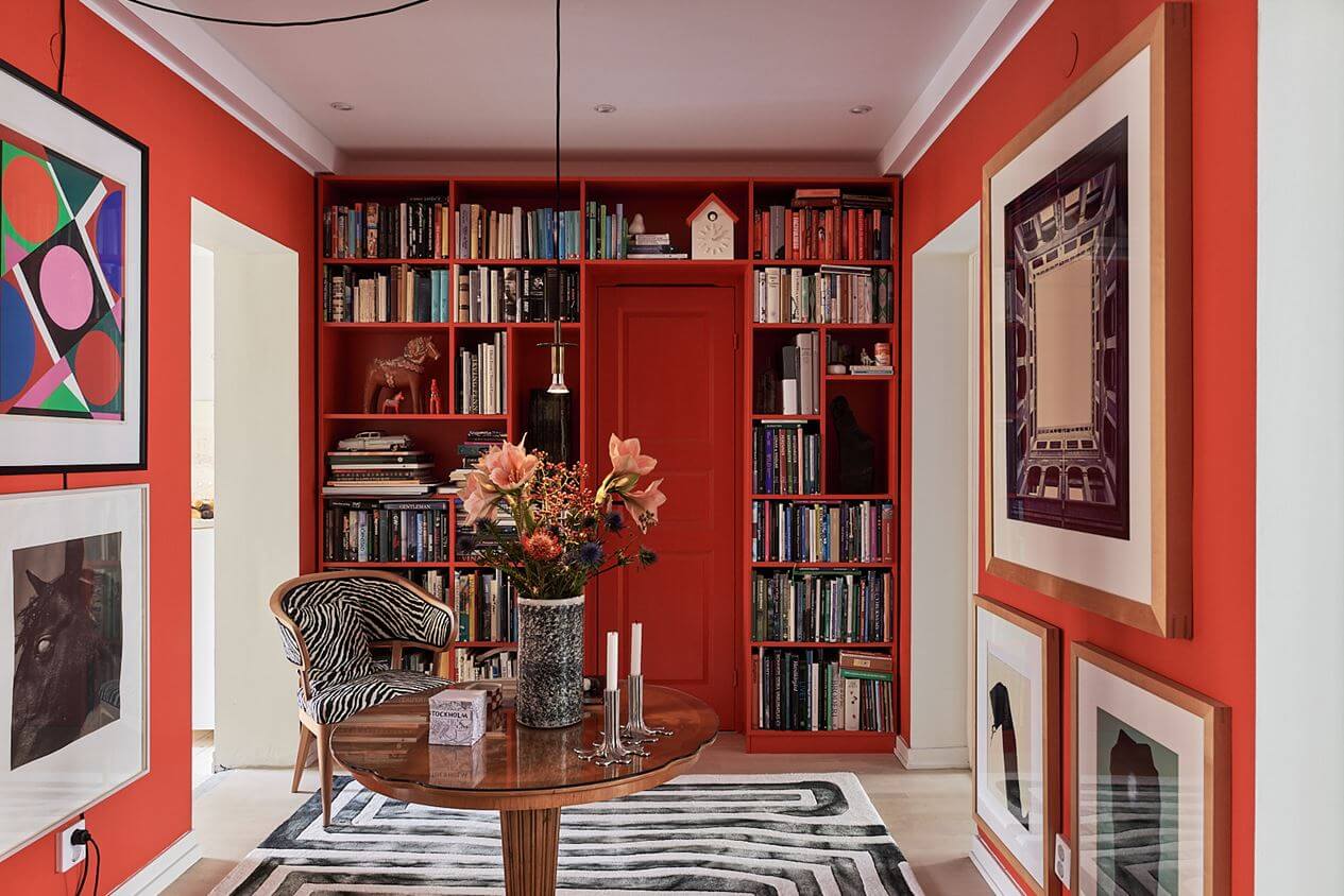 50+ Rooms That Prove ‘The Unexpected Red Theory’ Really Works 66 orange-red-inner-hall-built-in-bookcases-nordroom