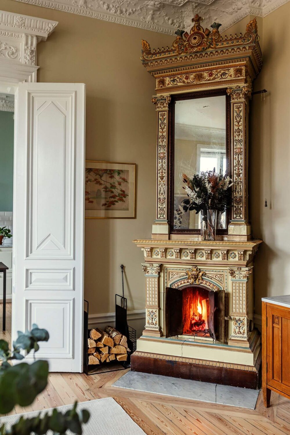 Stunning Fireplaces in a Historic Stockholm Apartment 5 ornate-fireplace-swedish-apartment-nordroom