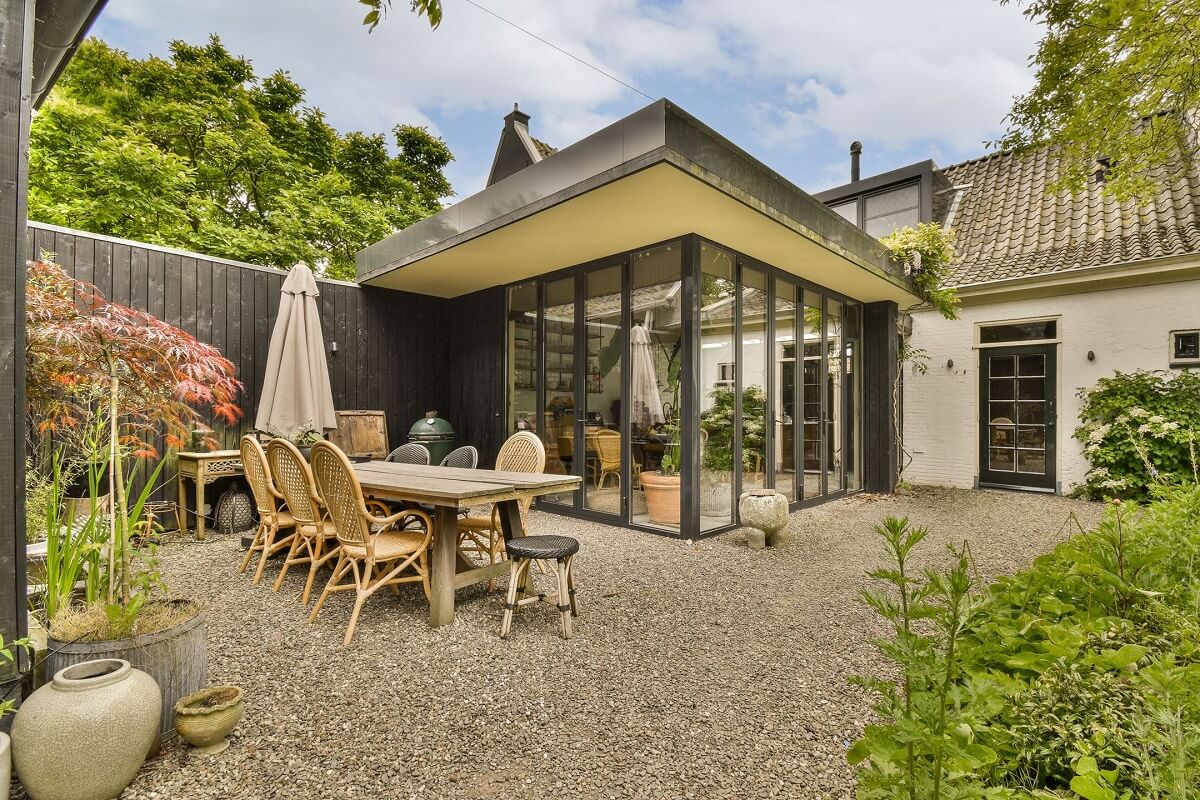 Wooden Interiors in a Historic Dutch Family Home 27 outdoor-dining-space-extension-dutch-house-nordroom