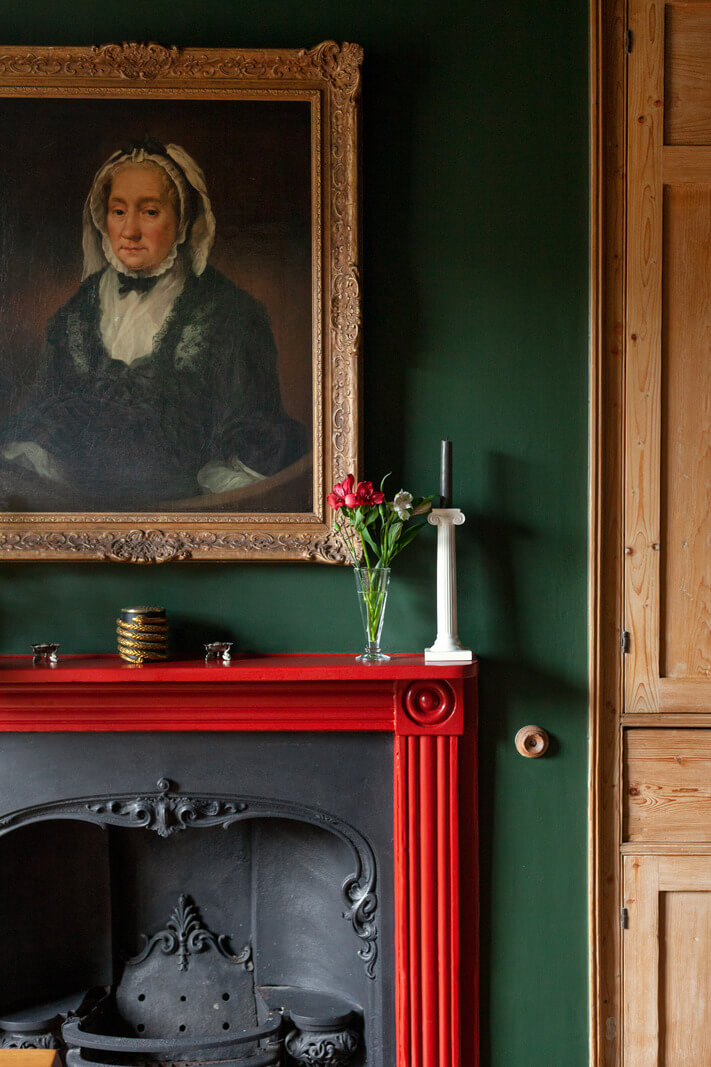 50+ Rooms That Prove ‘The Unexpected Red Theory’ Really Works 52 red-fireplace-dark-green-room-nordrom