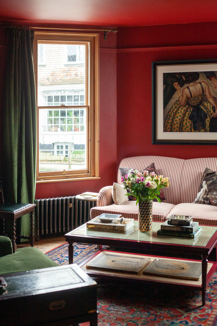 Bold Colors in a Charming Historic House in England 2 red-living-room-green-accent-color-nordroom