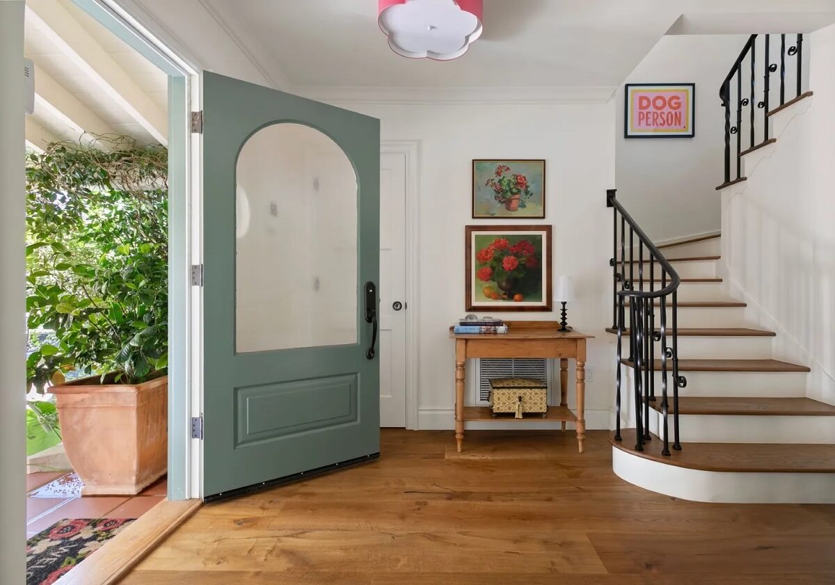 Emma Stone's Colorful Spanish-Style Los Angeles Home is For Sale 10 sage-green-front-door-hallway-emma-stone-nordroom