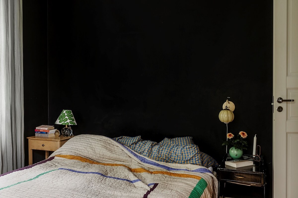 A Swedish Apartment with a Yellow Living Room 9 scandinavian bedroom black wall nordroom