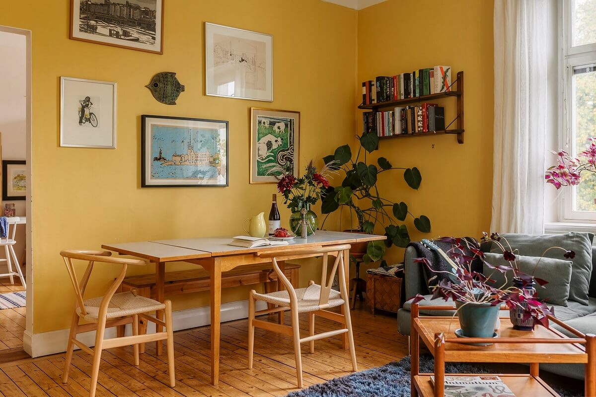 A Swedish Apartment with a Yellow Living Room 2 scandinavian living room with yellow walls and wooden floor nordroom