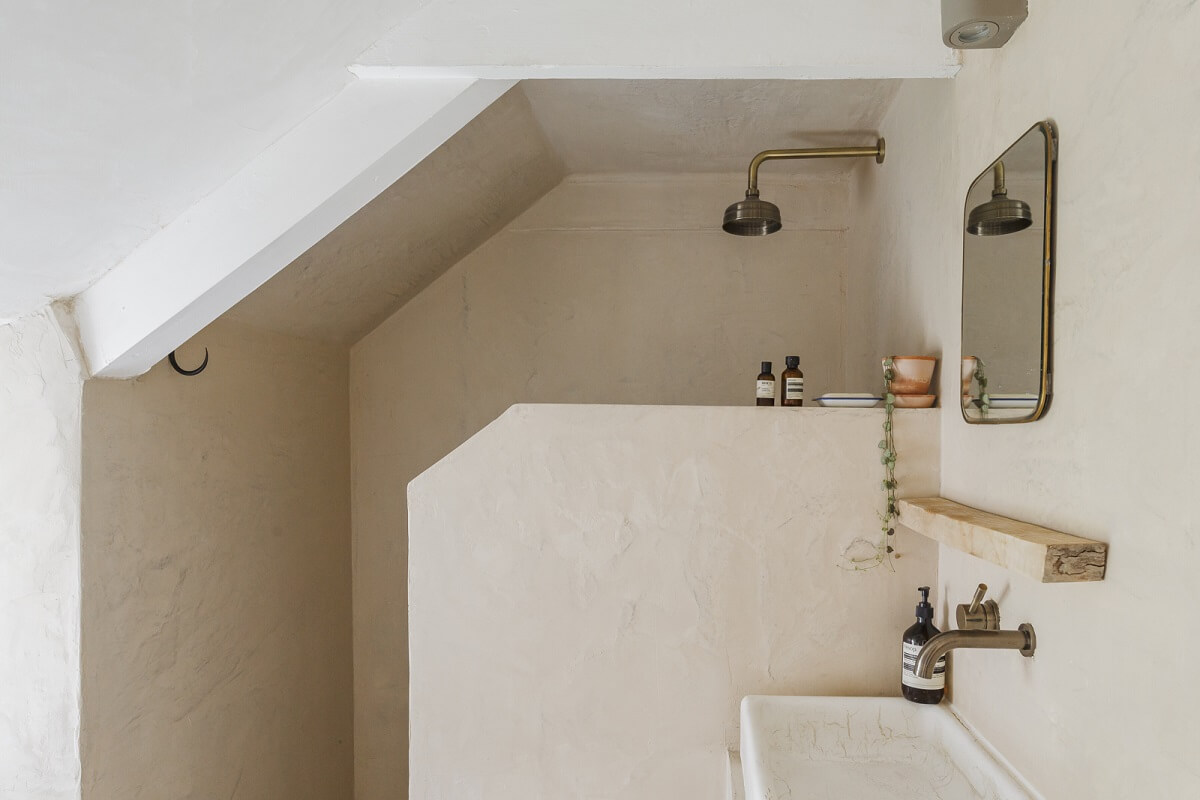A Serene English Cottage in Cornwall 19 serene-bathroom-slanted-ceiling-nordroom
