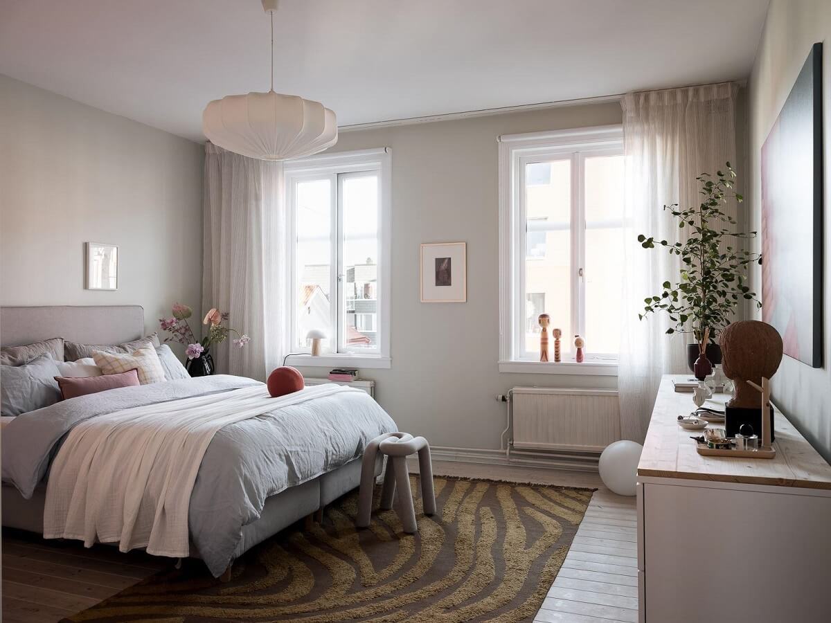 A Light-Filled Swedish Duplex is a Lovely Family Home 14 serene scandinavian bedroom light gray walls nordroom