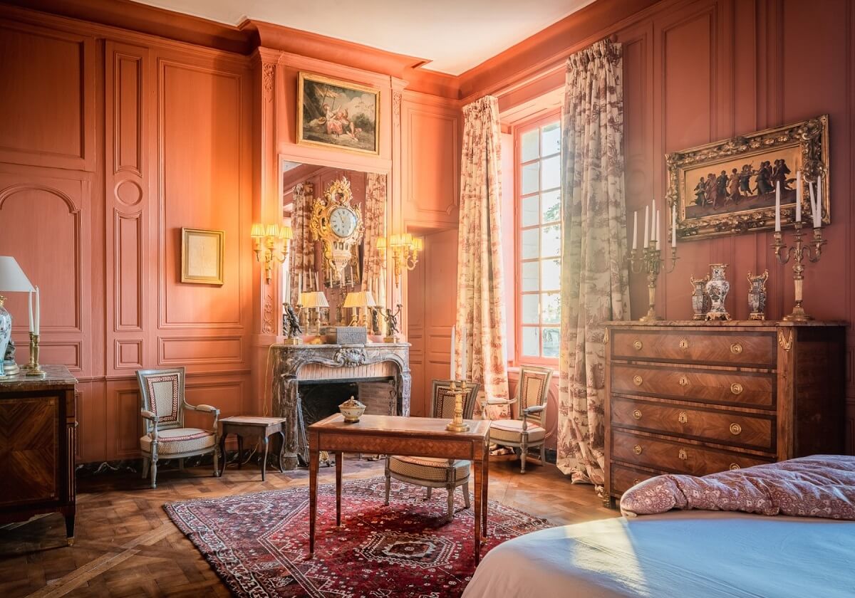 A Renovated 18th Century Chateau in France 14 terracotta wall color bedroom french chateau