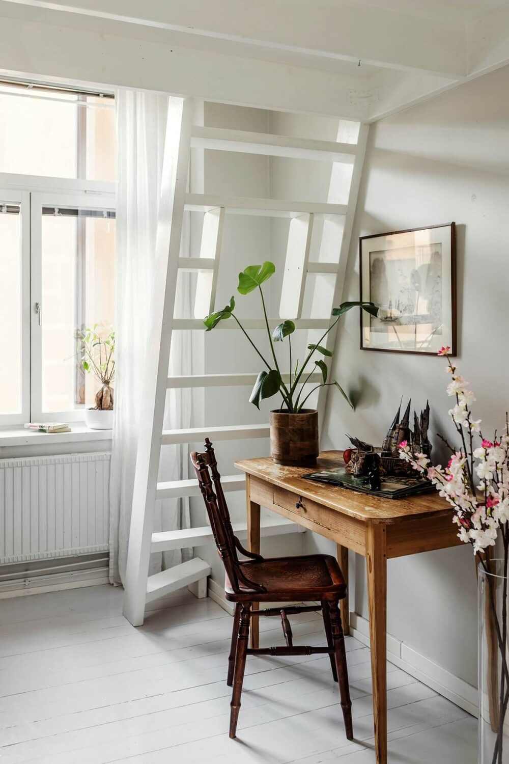 Stunning Fireplaces in a Historic Stockholm Apartment 22 white-bedroom-desk-loft-area-nordroom