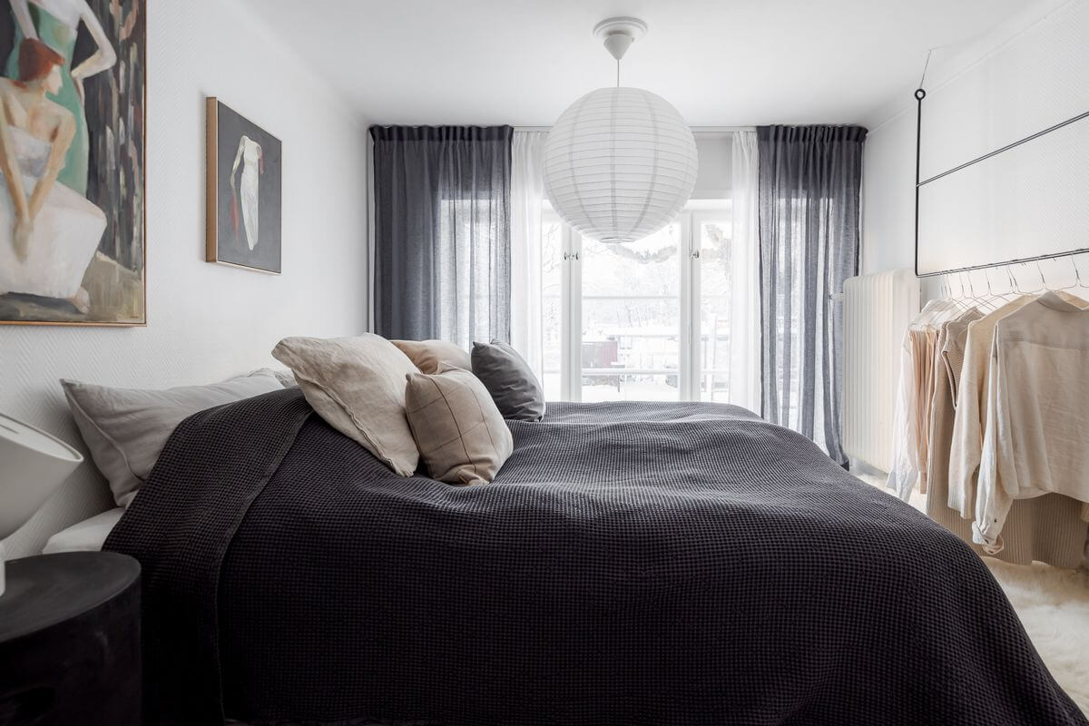 A Light Apartment with a Stainless Steel Kitchen 17 white gray bedroom hanging wardrobe