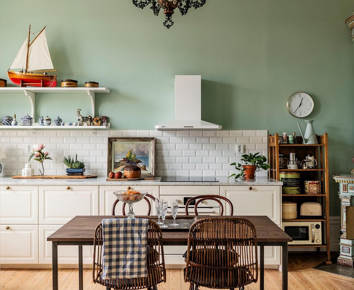 Stunning Fireplaces in a Historic Stockholm Apartment 9 white-kitchen-cabinets-mint-green-walls-nordroom