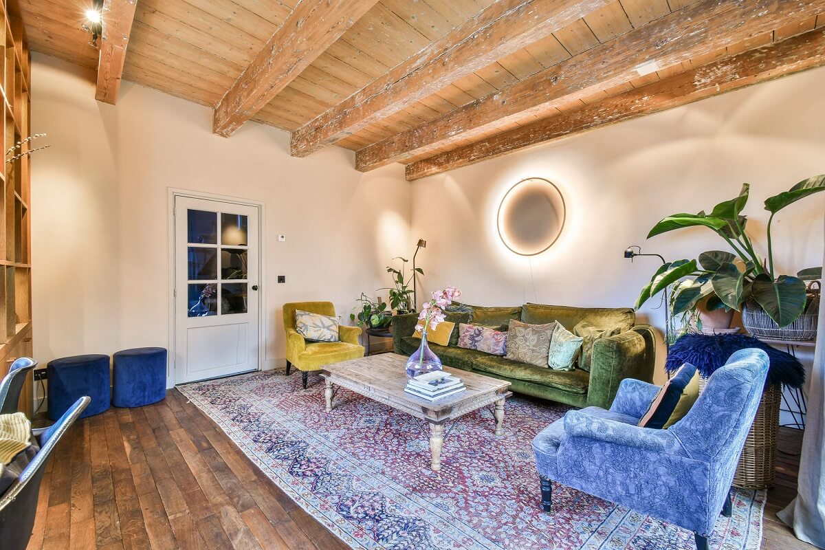 Wooden Interiors in a Historic Dutch Family Home 3 wooden-ceiling-living-room-green-sofa-nordroom