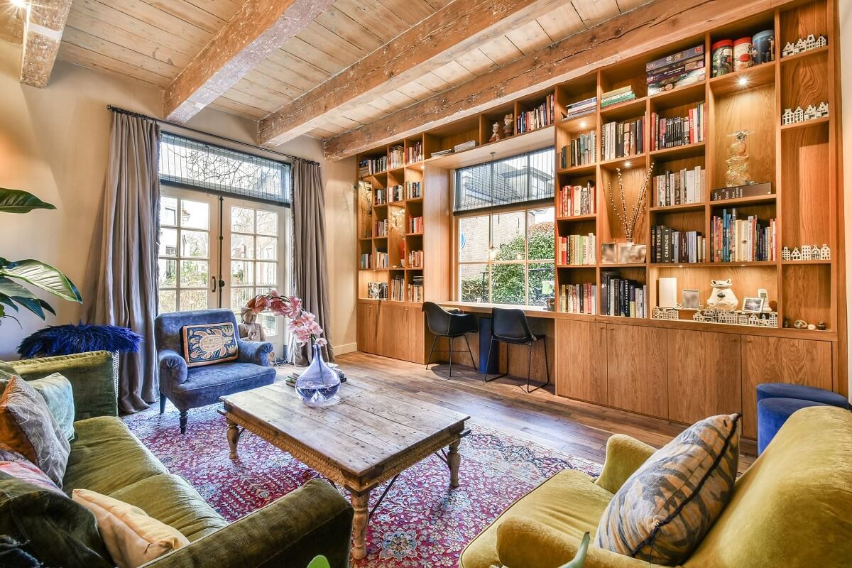 wooden-living-room-built-in-bookcases-desk-under-window-nordroom