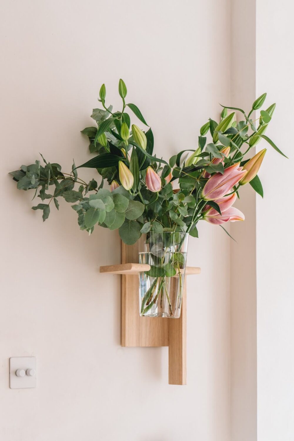 High Ceilings and Modern Design in a Light London Apartment 8 wooden wall vase