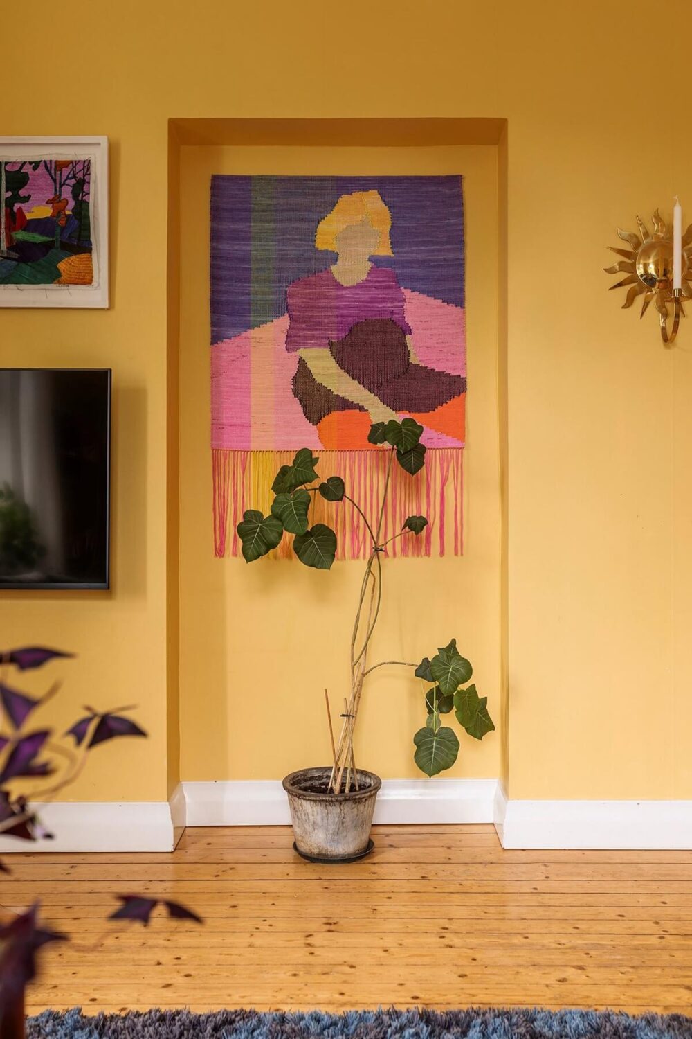 A Swedish Apartment with a Yellow Living Room 4 yellow walls scandinavian living room