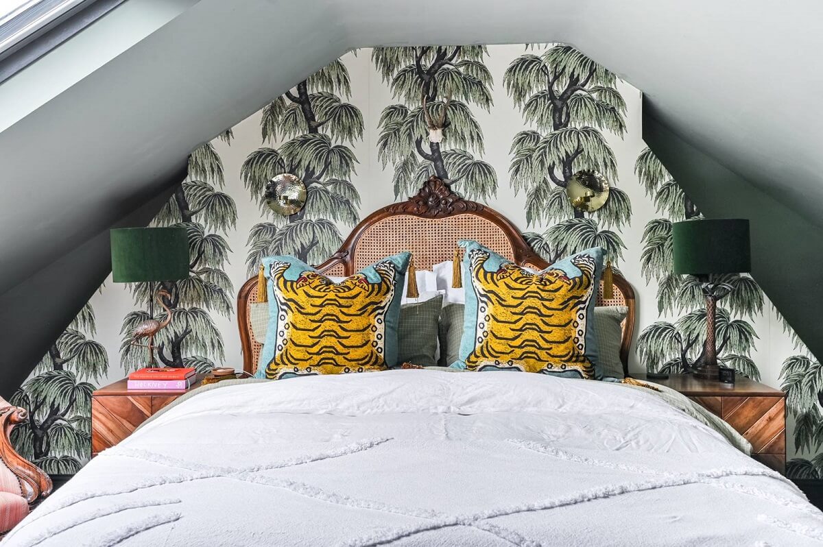 An Eclectic Victorian Townhouse in London 20 attic-bedroom-leaf-wallpaper-antique-bed-nordroom