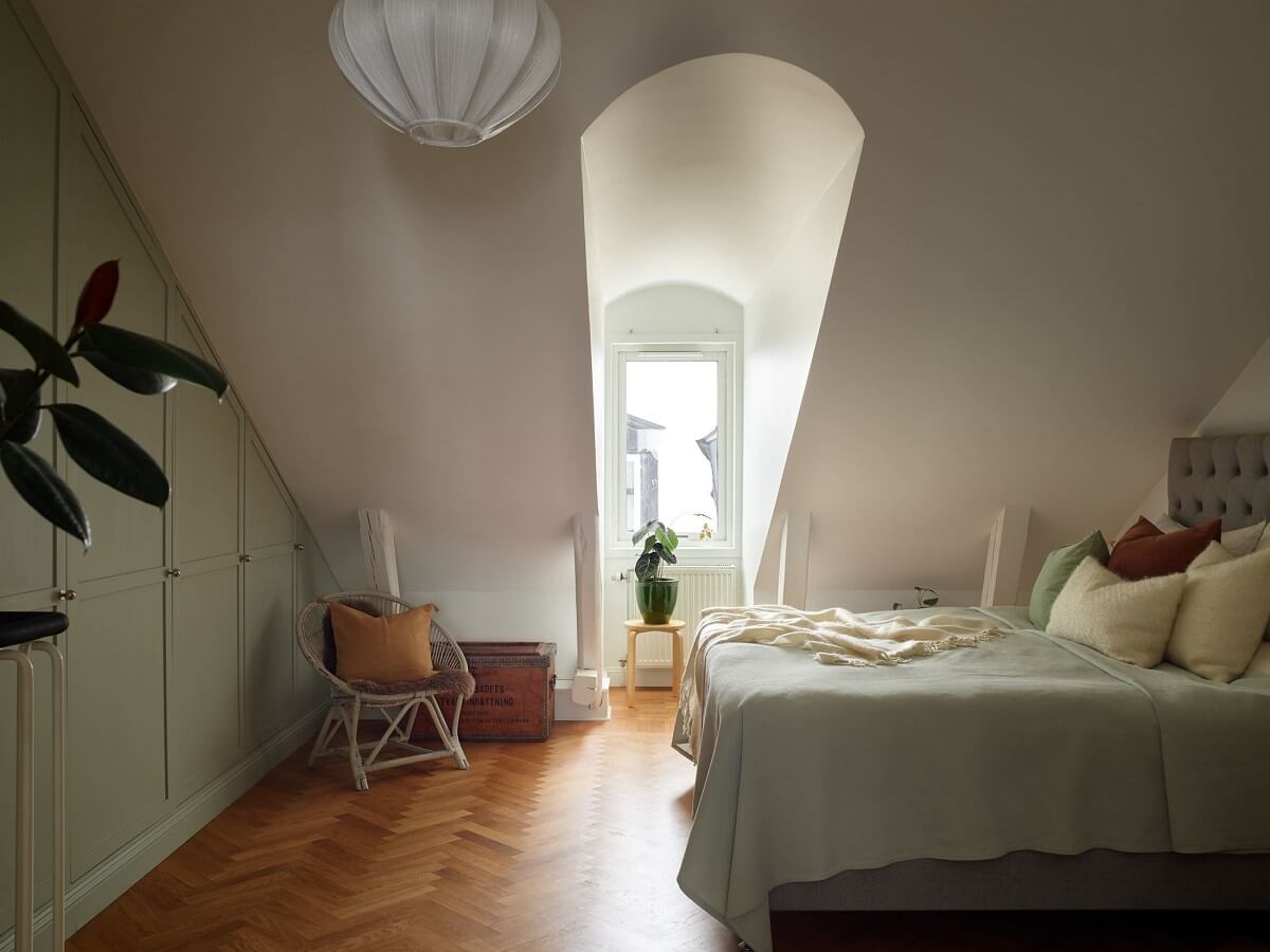 Green Tones in a Renovated Stockholm Duplex Apartment 13 attic bedroom with built in wardrobes