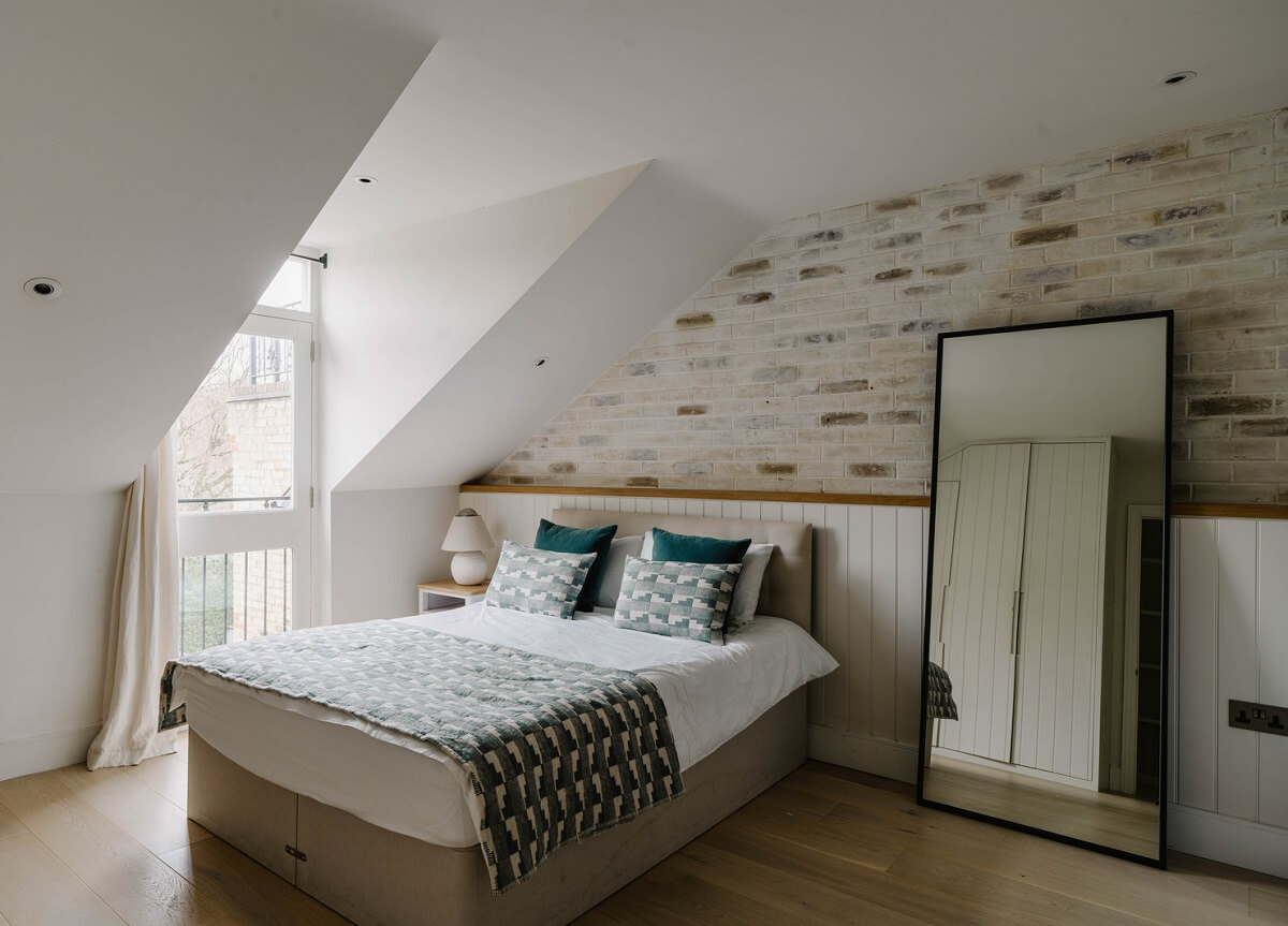 Colorful Walls in an English Victorian Townhouse 22 attic loft bedroom brick wall nordroom