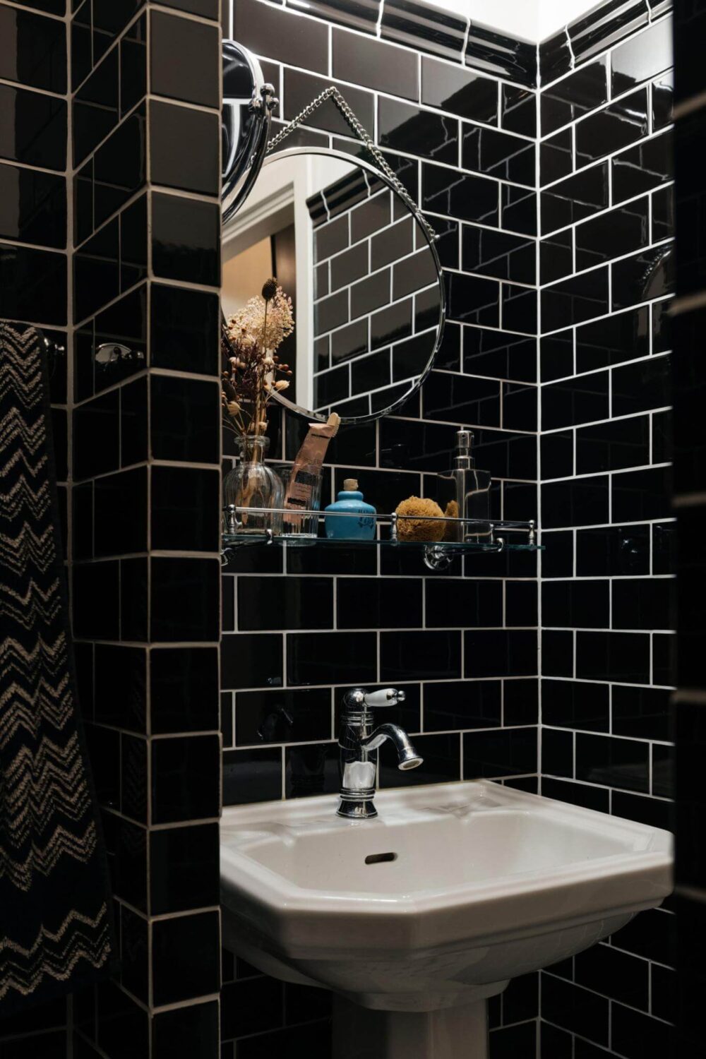 An Industrial Apartment with Black Walls 17 bathroom with black tiles nordroom