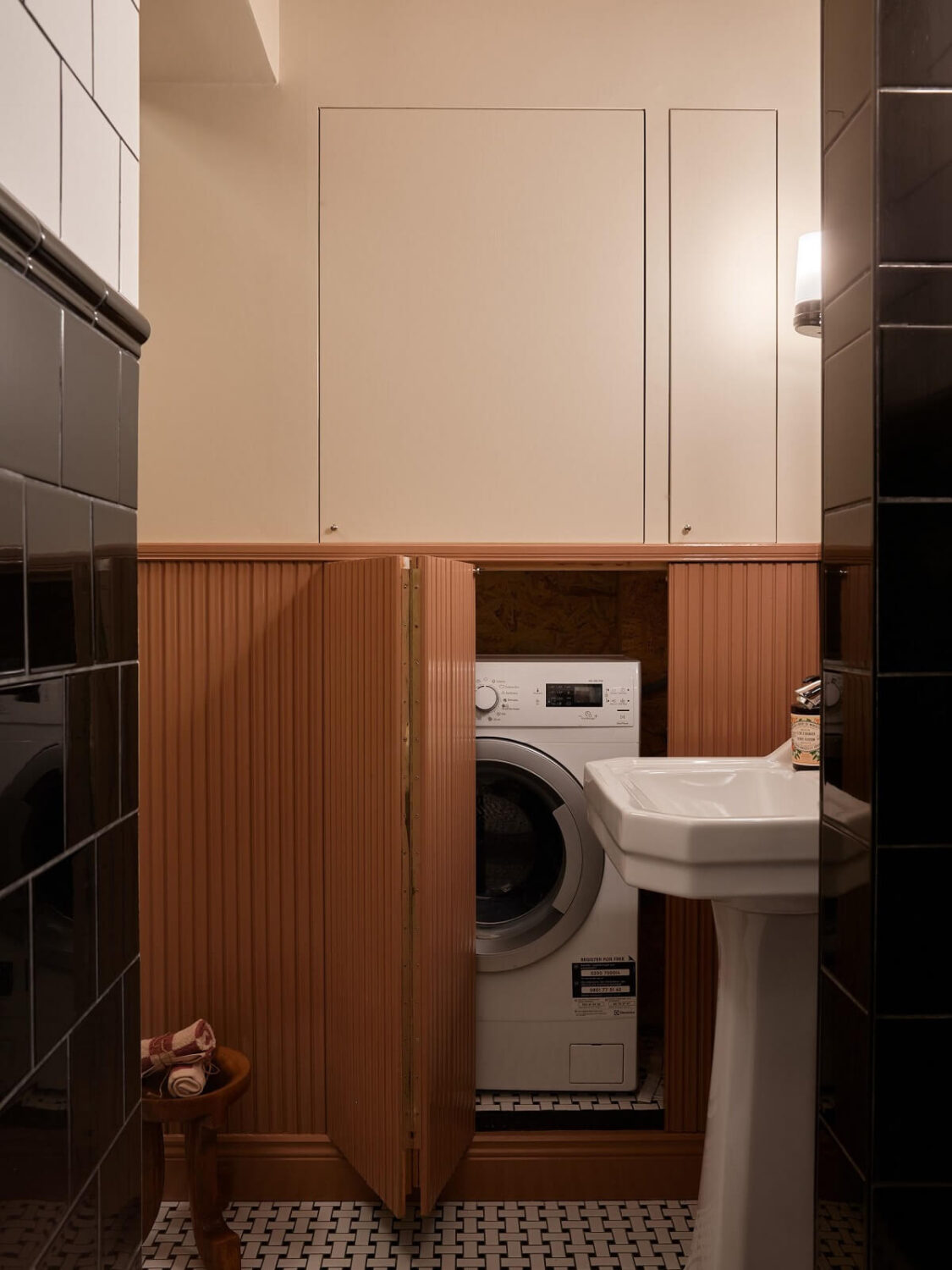 Cozy Vintage Style in a Swedish 1920s Apartment 22 bathroom with peach colored cabinets nordroom