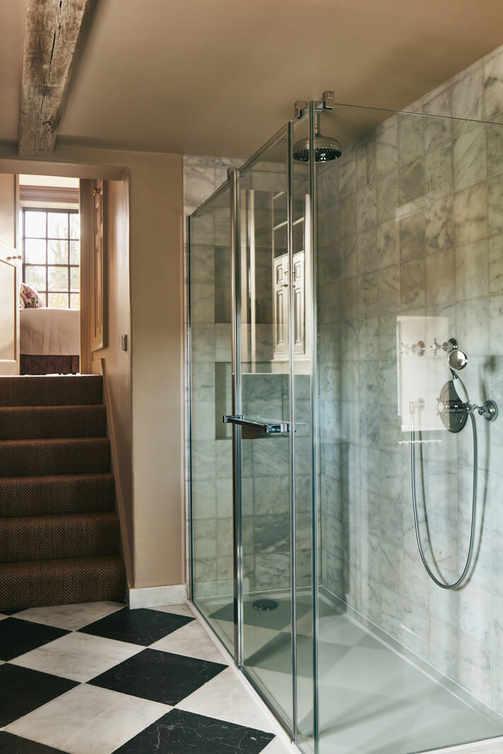 A Historic English Country House with Restored Interiors 22 bathroom with shower and checkerboard floor