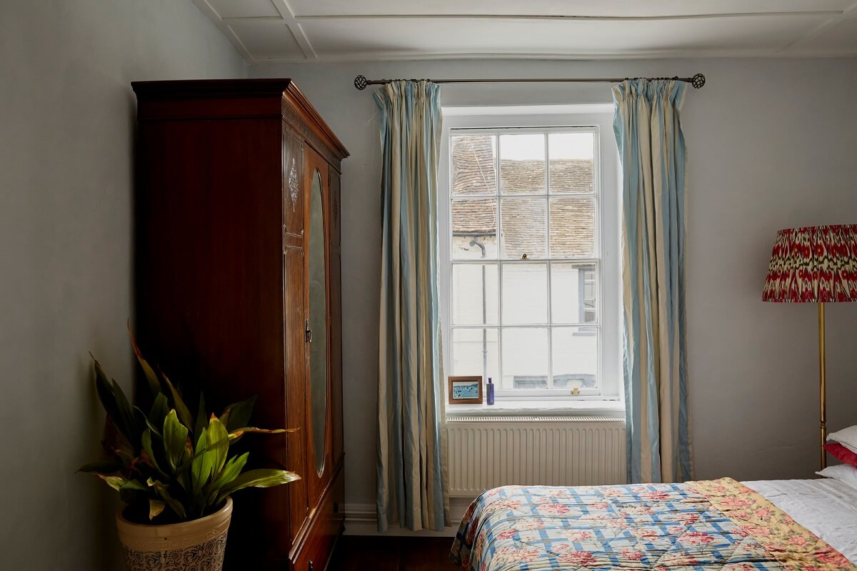 A Cozy Home with Exposed Beams in a Former Post Office 12 bedroom antique wardrobe
