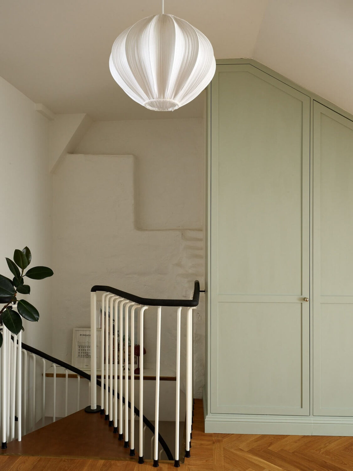 Green Tones in a Renovated Stockholm Duplex Apartment 19 bedroom built in wardrobe