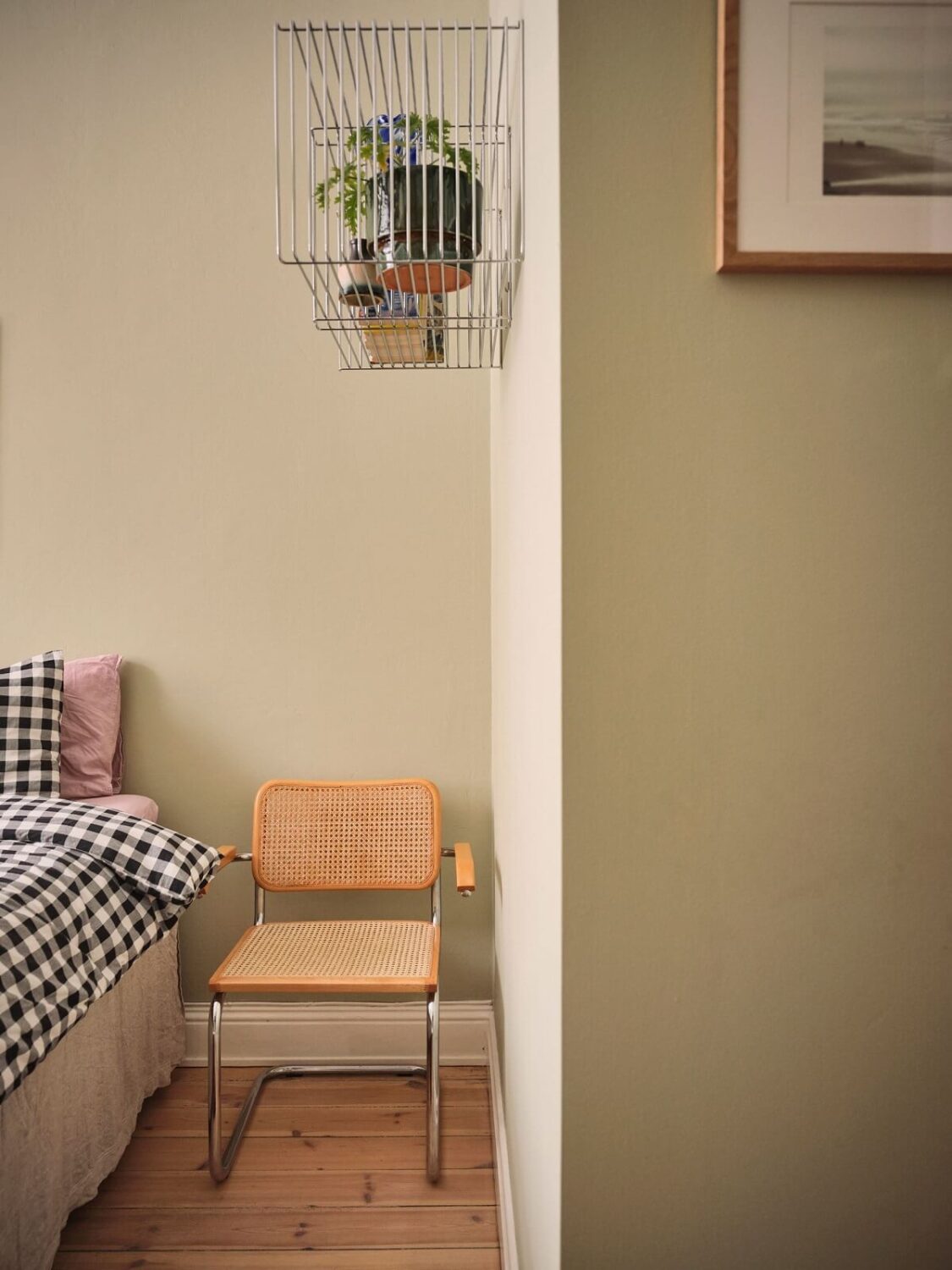 Serene Light Painted Spaces in a Swedish Apartment 14 bedroom-light-green-walls-nordroom