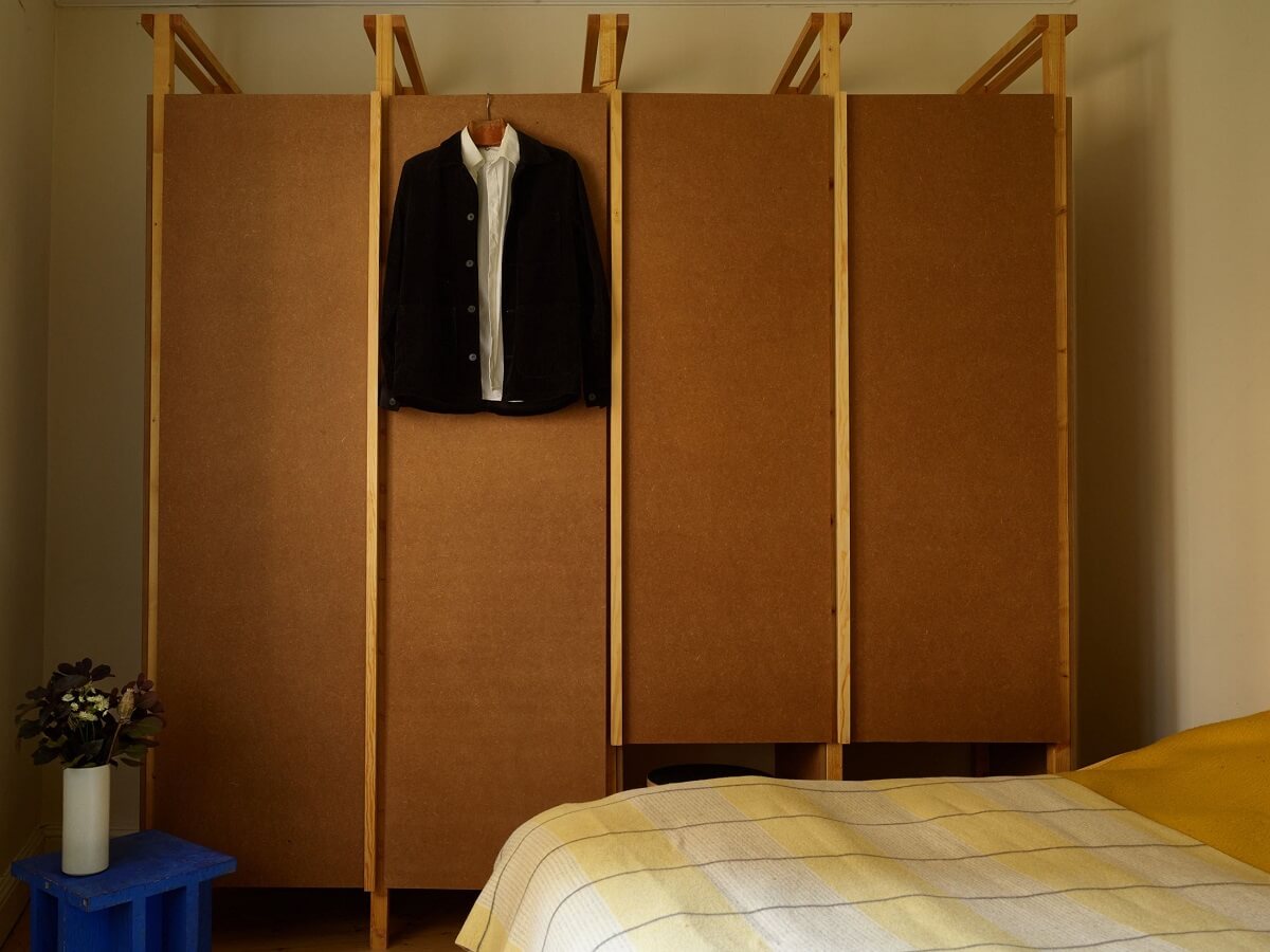 A Cozy Swedish Apartment Filled with Charm 13 bedroom with custom wardrobes
