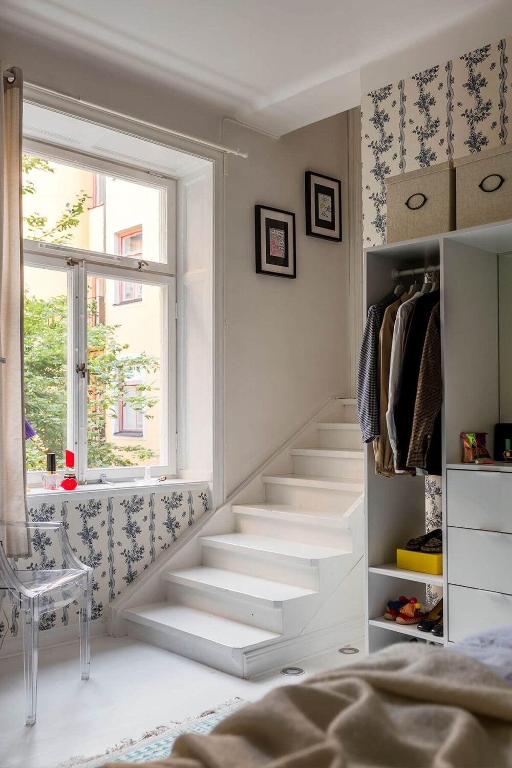 A Small Split-Level Apartment in Stockholm 11 bedroom with wallpaper