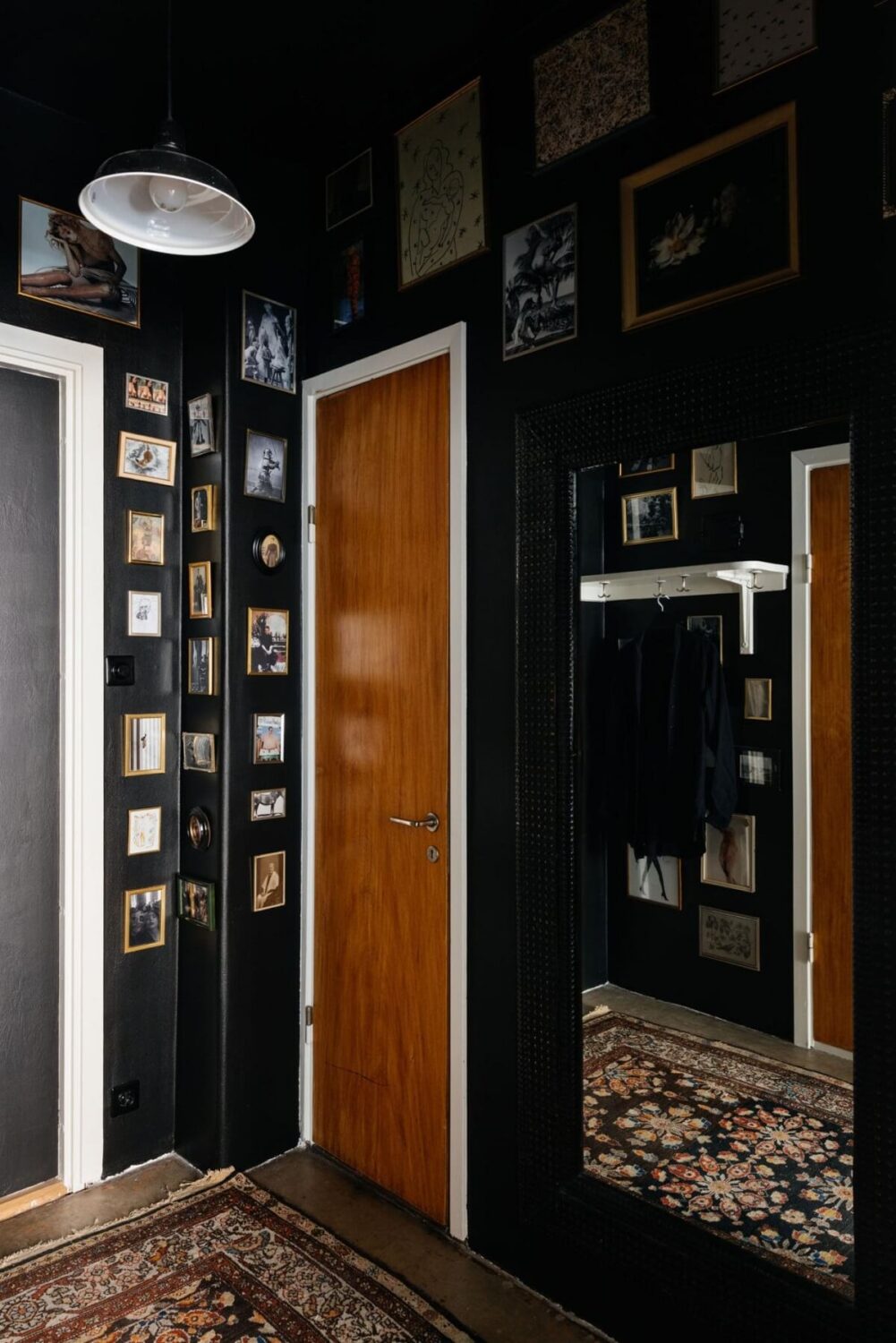 An Industrial Apartment with Black Walls 20 black hallway