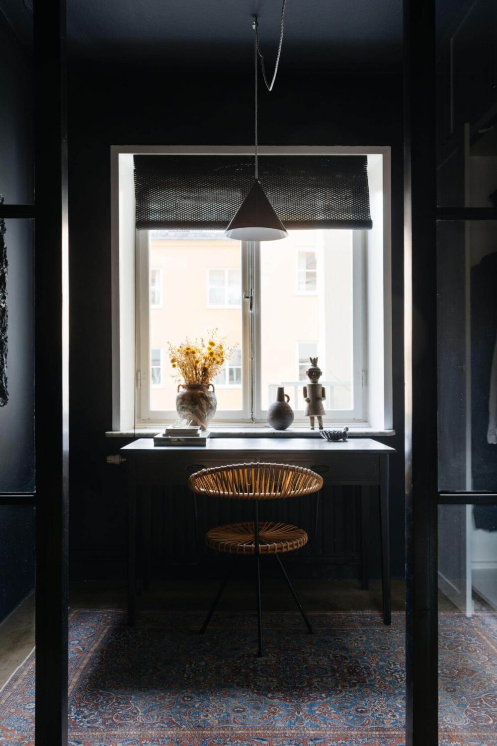 An Industrial Apartment with Black Walls 12 black home office