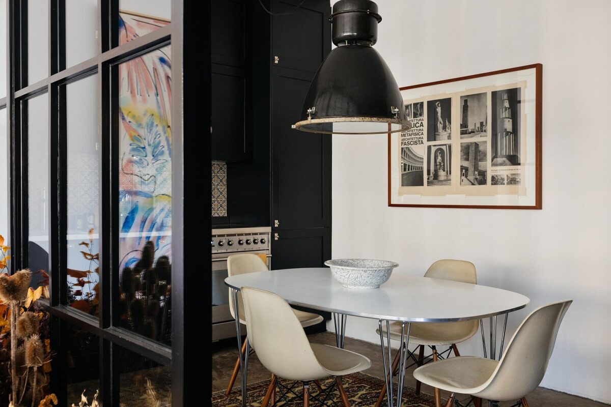 An Industrial Apartment with Black Walls 4 black wall in industrial style kitchen