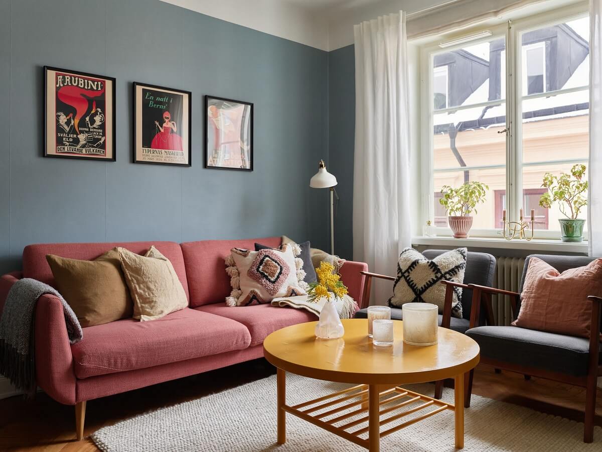 Green Tones in a Renovated Stockholm Duplex Apartment 3 blue gray walls pink sofa
