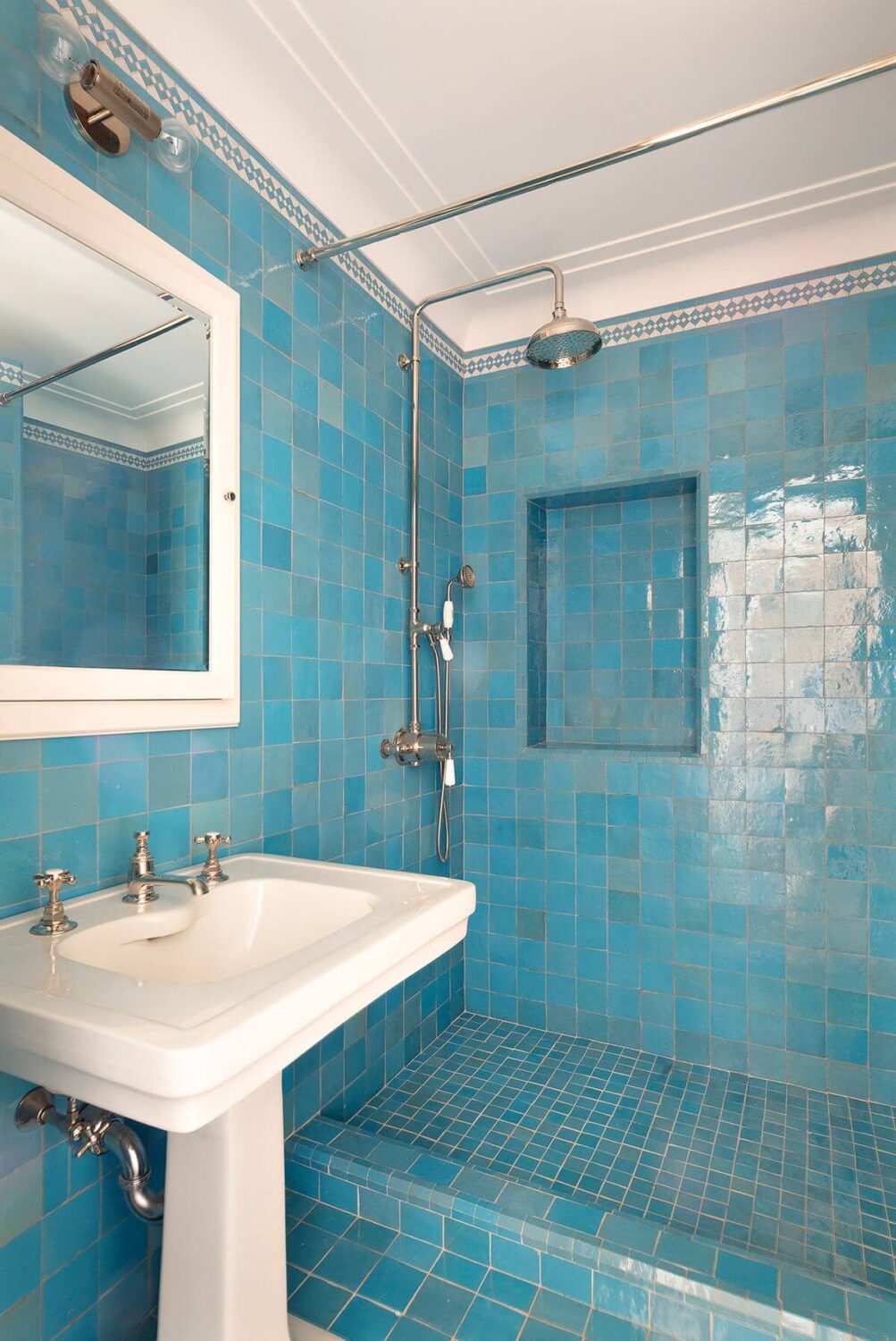 A New York Penthouse with a Rooftop Cottage 15 blue tiles bathroom with shower