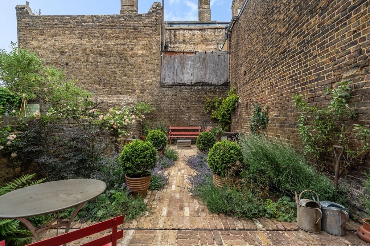 A Colorful Historic Family Home in London 32 brick wall garden london home