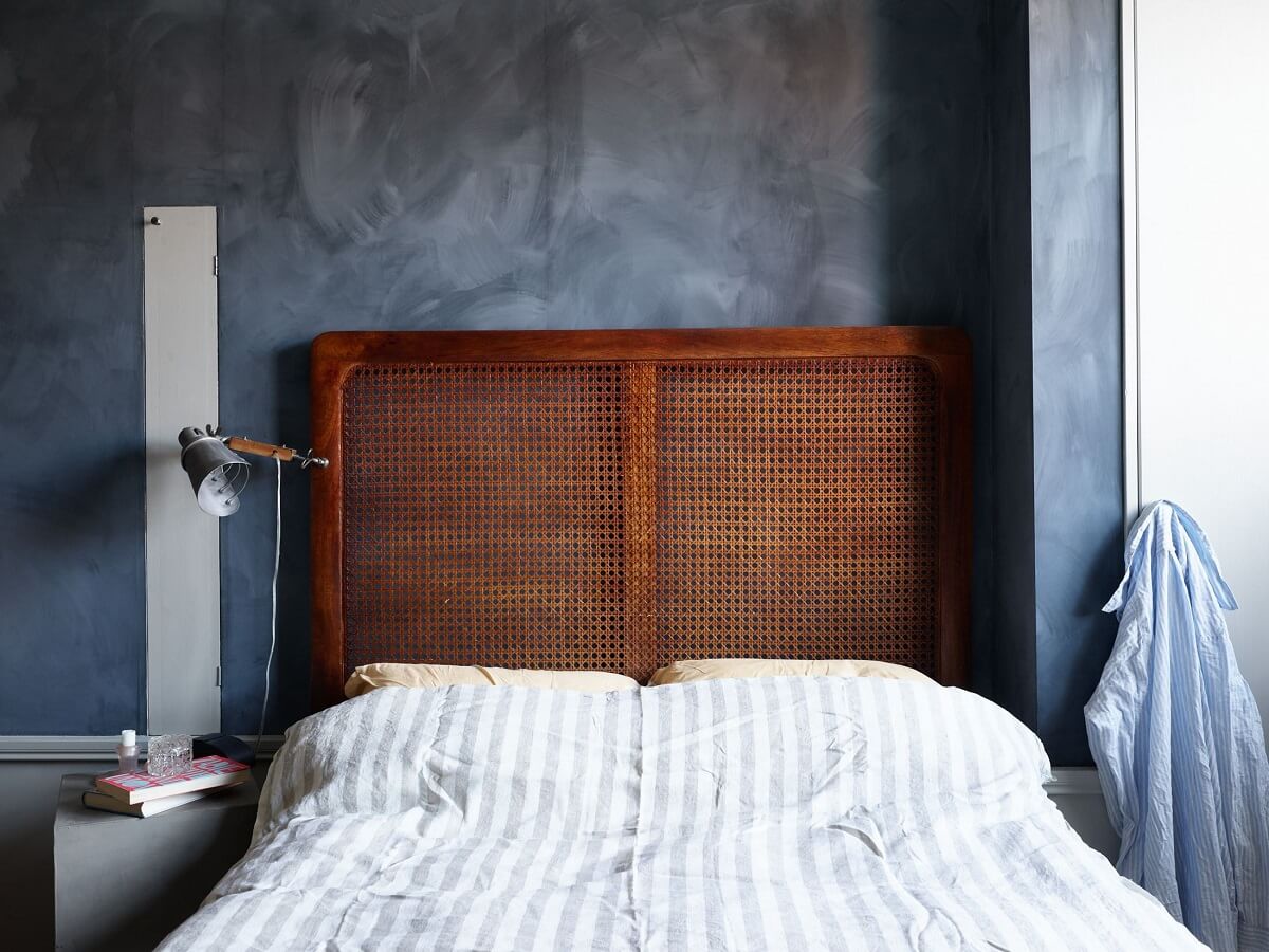 Cozy Vintage Style in a Swedish 1920s Apartment 19 cane headboard with blue walls nordroom