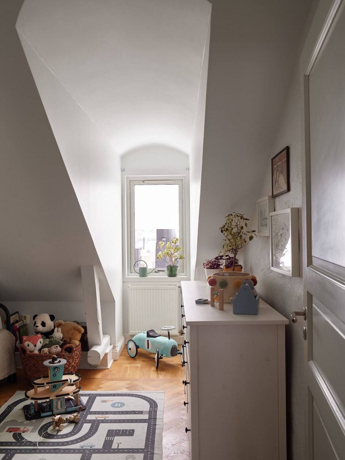 Green Tones in a Renovated Stockholm Duplex Apartment 21 childrensbedroom slanted ceiling